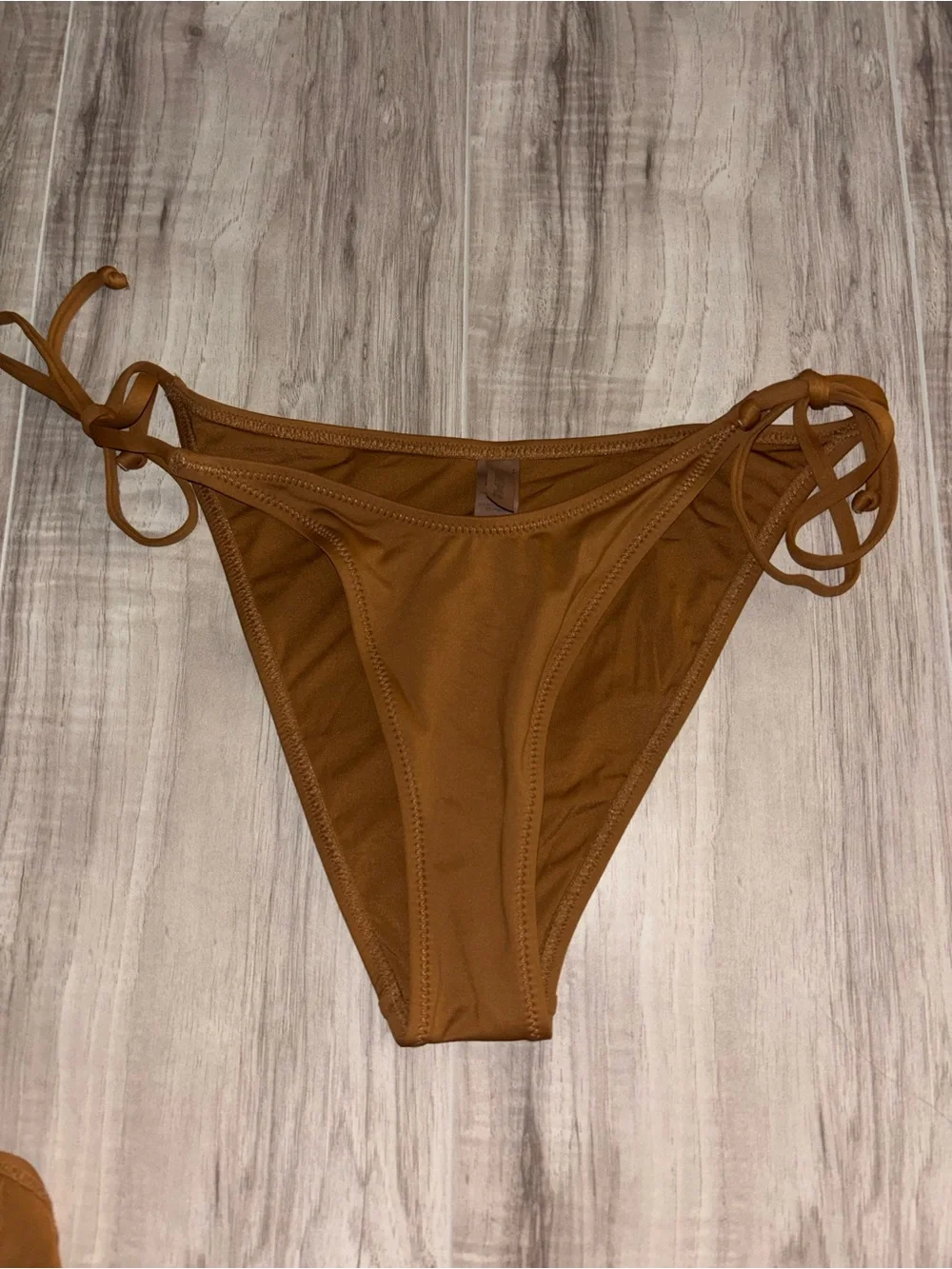 SKIMS bikini set dipped tie bottoms and top in warm tan